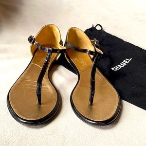 CHANEL-  little golden flat sandals with logo on heels with dust bag .